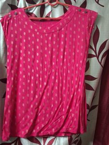a pink short kurti