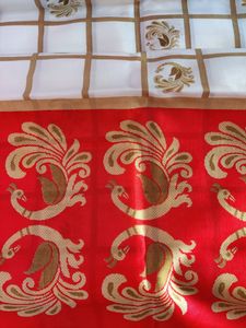 Beautiful white saree and red border with golden p