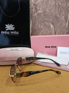 Miu-Miu Sunglasses - Pink Oval Fram