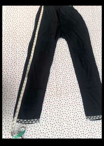 Elegant Black Kurta Set with Embellished Neckline