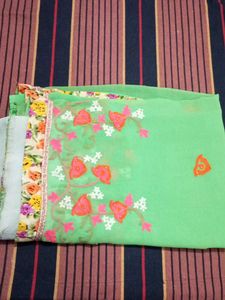 Beautiful Green Saree with Floral Embellishments