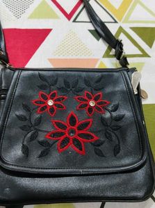 Chic Black Crossbody Bag with Floral Embroidery