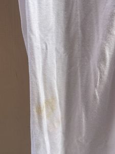 White Sleeveless Top with Embellished Neckline