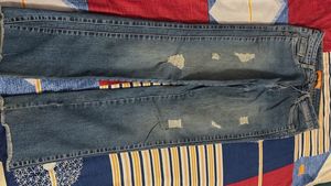 Distressed Blue Denim Jeans