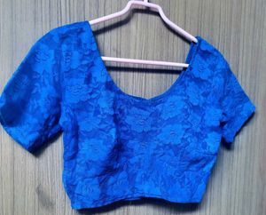 Elegant blue lace blouse with a back open