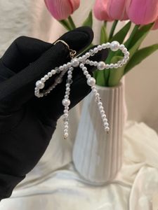 Bow Key Chain With Pearl