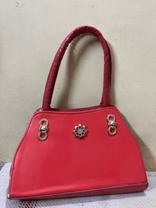 Red Handbag with Embellishments