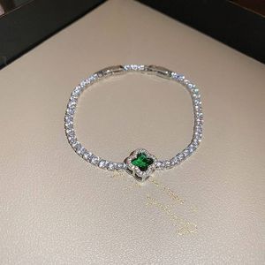 Elegant Clover Bracelet with Emerald Accent