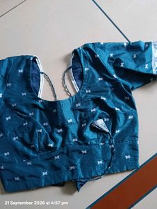 Elegant Teal Saree with Intricate Designs
