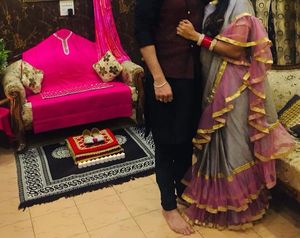 Elegant Grey Saree with Pink Ruffle Border