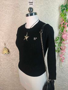 Chic Black Cable Knit Sweater with Bow Detail