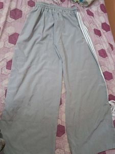 A grey flared, casual pants.