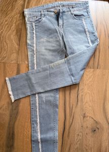 Light Wash Distressed Denim Jeans