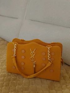 Stylish Yellow Tote Bag with Gold Accents