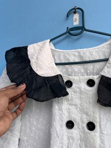 Chic White Top with Black Collar