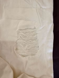 Cream Distressed Wide-Leg Jeans