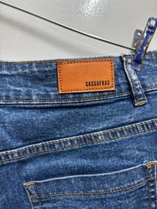 Ripped Wide Leg Denim Jeans