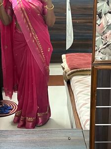 Elegant Pink Saree with Golden Detailing
