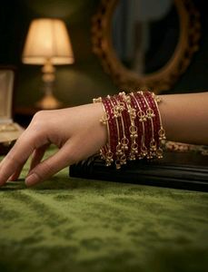 Elegant Red Bangles with Gold Accents
