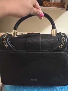 Chic Black Textured Shoulder Bag with Gold Chain
