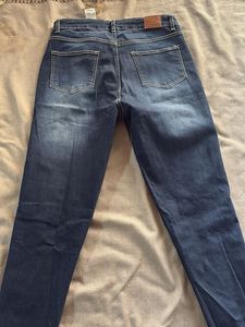 Distressed Blue Denim Jeans