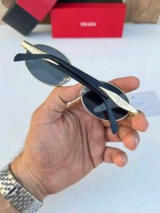 prada Sunglasses - Gold Frame