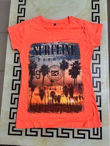 Bright coral/orange color casual t-shirt with styl