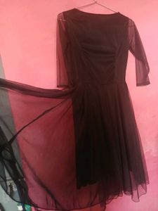 Elegant Black Dress with Sheer Sleeves