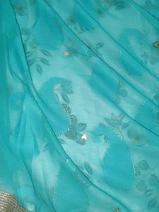 Elegant Teal Saree with Gold Border