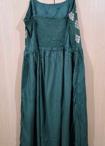 Green Embroidered Maxi Dress with golden jacket