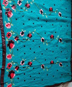 Elegant Teal Saree with Floral Embroidery