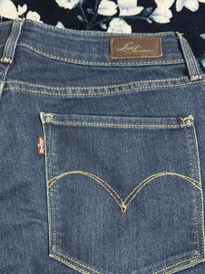 ankle length dark wash denim jeans