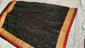 Elegant Black Saree with Gold Border
