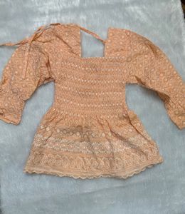 Peach Embroidered Smocked top