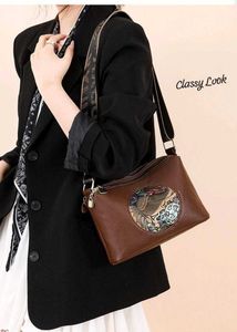 Embossed Elephant Sling Bag