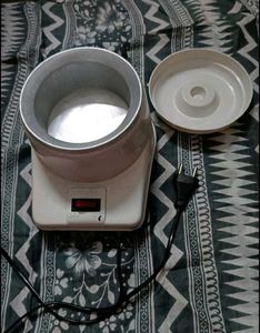 Electric wax heater machine