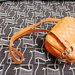 Orange Quilted Crossbody Bag
