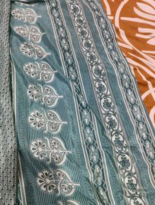 Elegant Teal Printed Saree without blouse