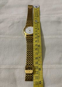 Sonata Gold Analog Watch (Unisex)