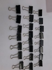 1 Box Containing 23 Black Binder Clips