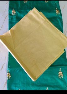 Embroidered unstitched dress material