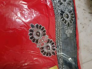 Elegant Coral Embroidered Saree