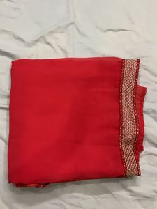 Elegant Red Saree with Embellished Border