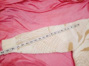 Cozy Cream Cardigan with Unique Pattern