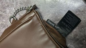 Chic Brown Shoulder Bag with Chain Accent