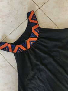 Elegant Black Maxi Dress with Geometric Neckline