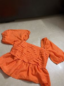 Orange Puff Sleeve Peplum Top