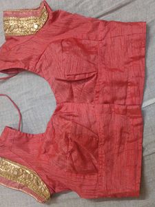 Stylish Coral Blouse with Embellished Neckline