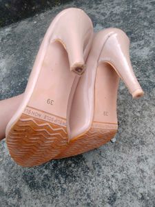 Elegant Nude Patent Leather Stilettos