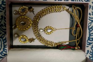 Beautiful yellow kundan and pearls Set